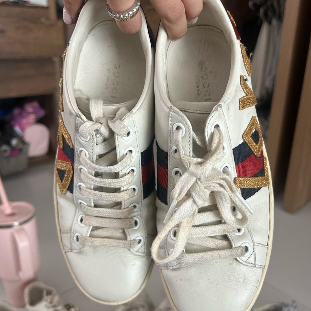 Gucci White Sneakers with Gold and Red Details